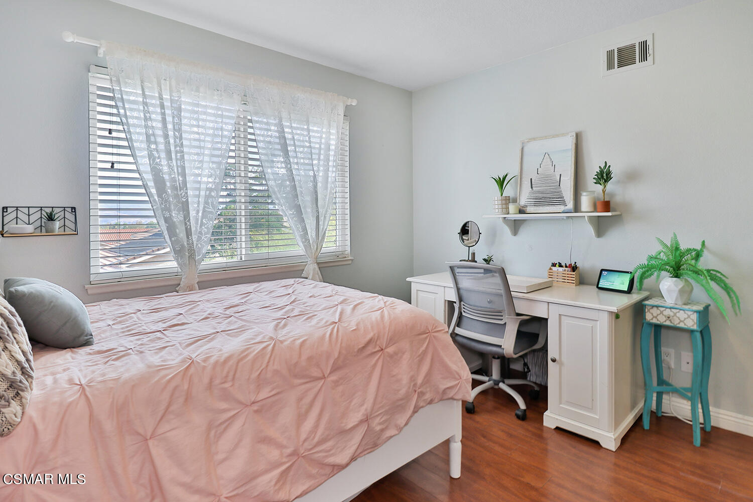 3053 Bianca Circle Simi Valley, CA 93063 - Photo 50 of 73 a bedroom with a bed and a chair