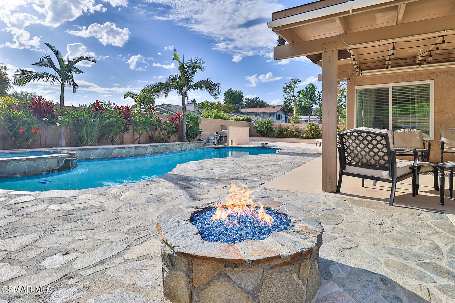 3053 Bianca Circle Simi Valley, CA 93063 - Photo 60 of 73 a view of a backyard with a patio and a garden