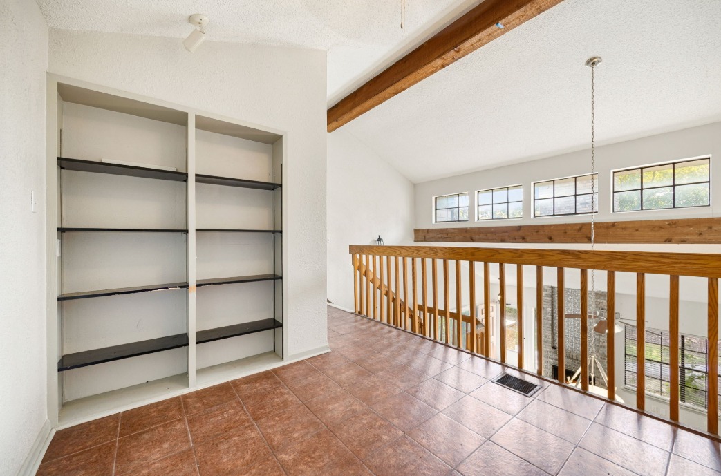 1748 Ohlen Road, Unit 42 Austin, TX 78757 - Photo 13 of 17 a view of a balcony