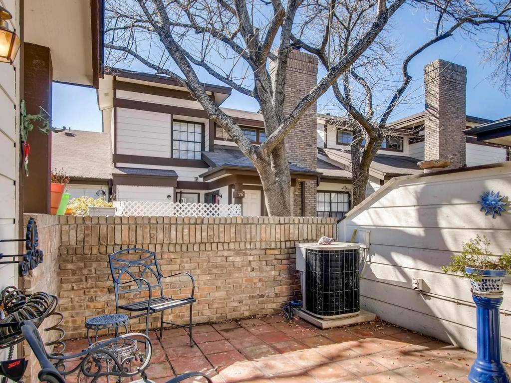 1748 Ohlen Road, Unit 42 Austin, TX 78757 - Photo 14 of 17 a front view of a building with a bench
