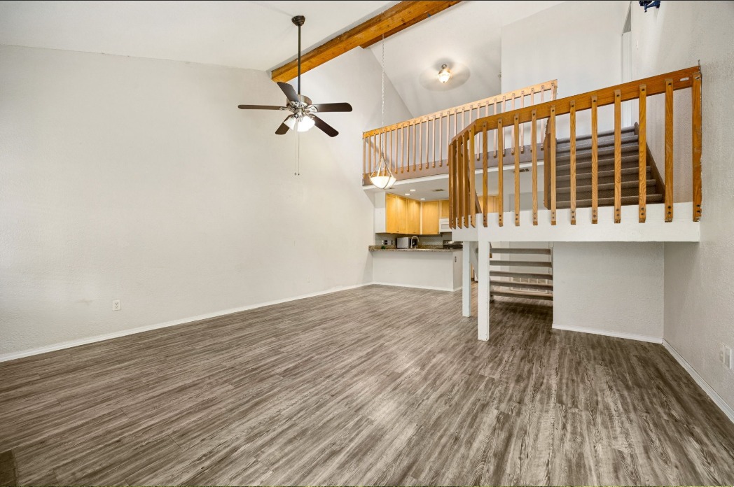 1748 Ohlen Road, Unit 42 Austin, TX 78757 - Photo 7 of 17 a view of empty room with wooden floor and fan