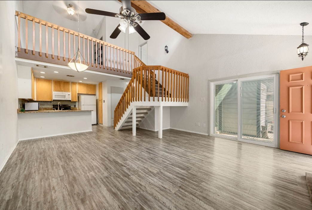 1748 Ohlen Road, Unit 42 Austin, TX 78757 - Photo 8 of 17 a view of an entryway with wooden floor