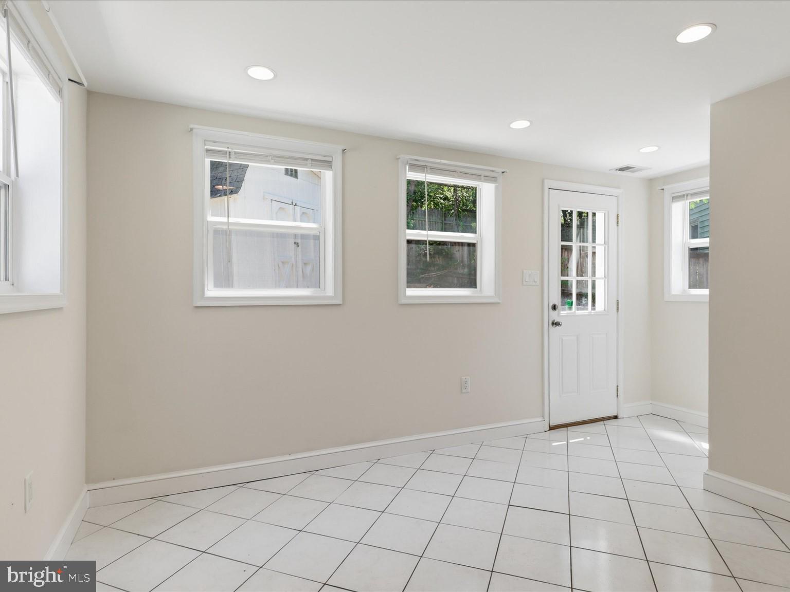 6003 Rixey Drive Alexandria, VA 22303 - Photo 12 of 37 Dining area and rear kitchen entrance