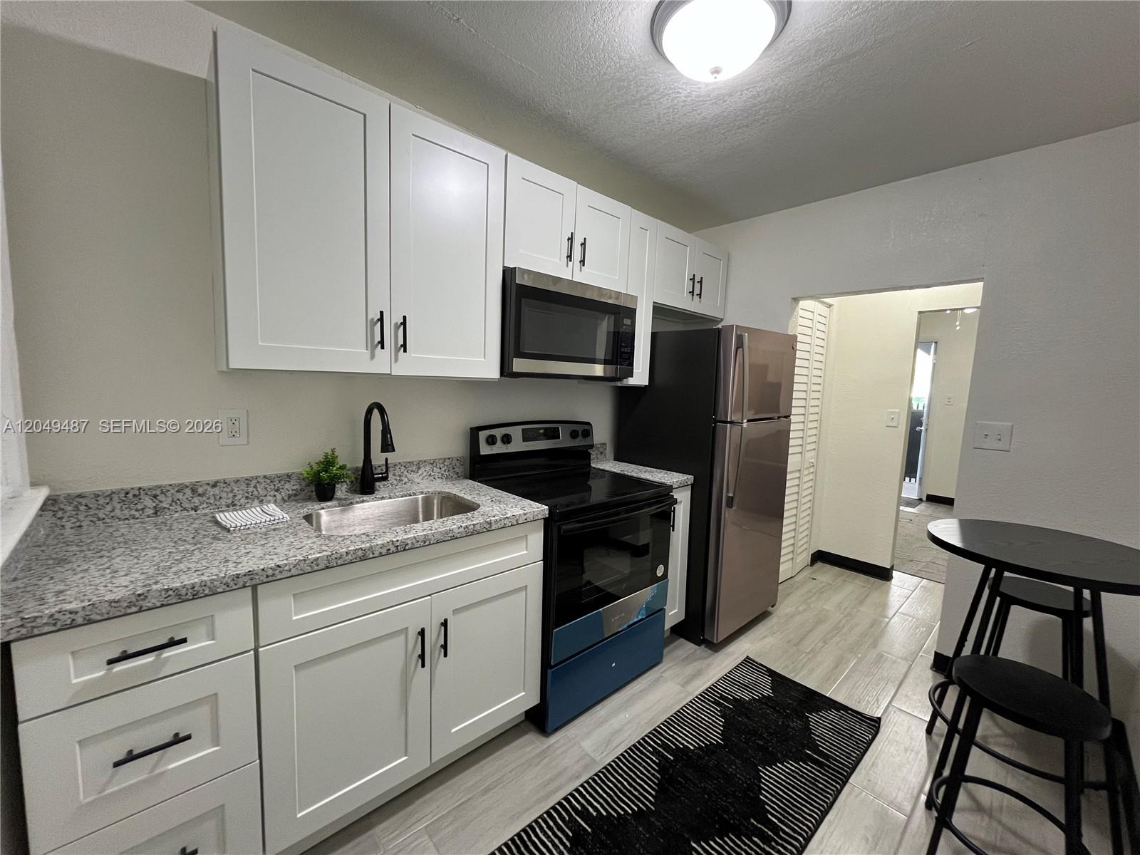 140 Northwest 13th Street, Unit 150 5 Miami, FL 33136 - Photo 1 of 12