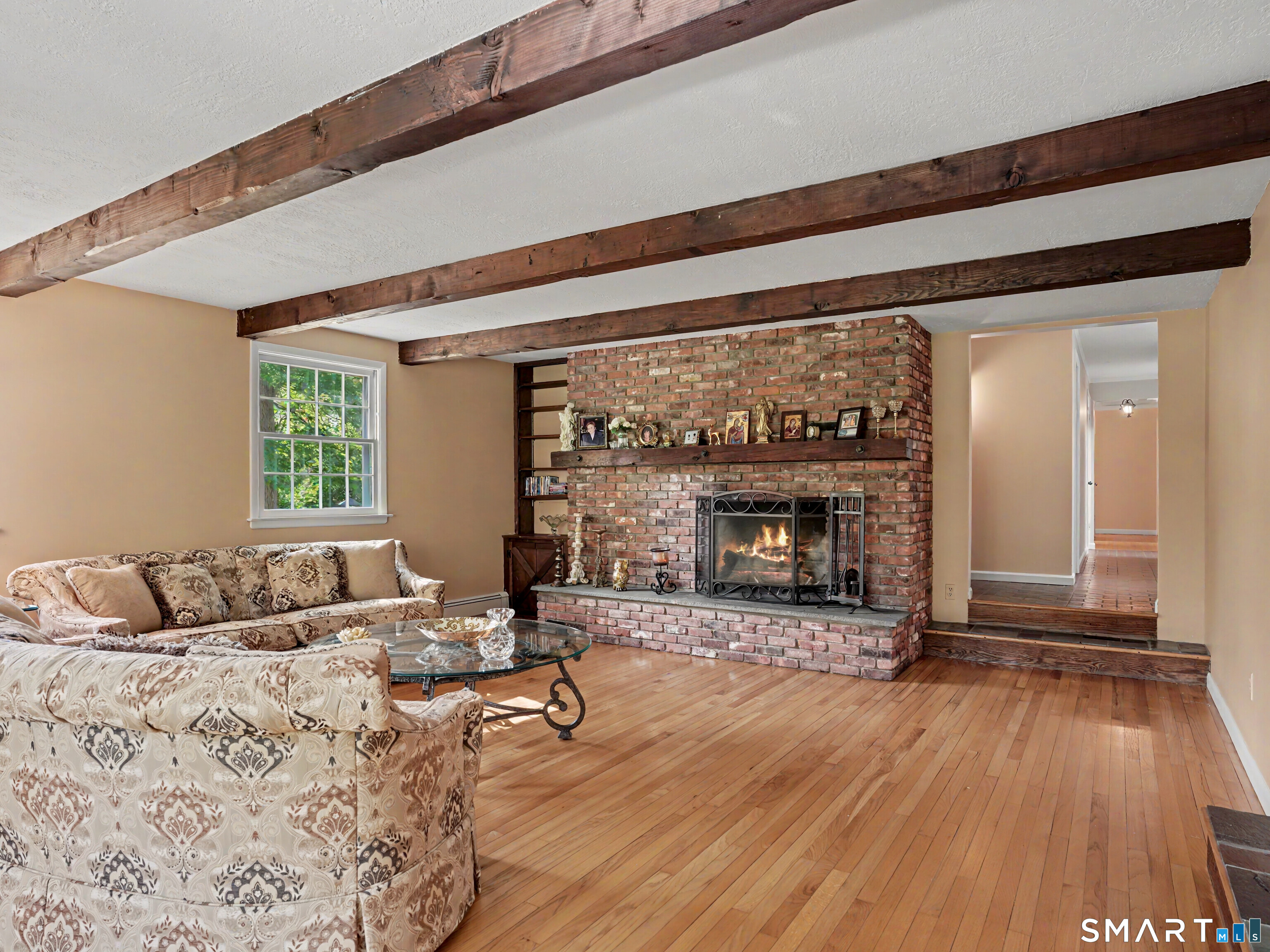 15 Flat Rock Drive Ridgefield, CT 06877 - Photo 5 of 39 a living room with furniture and a fireplace