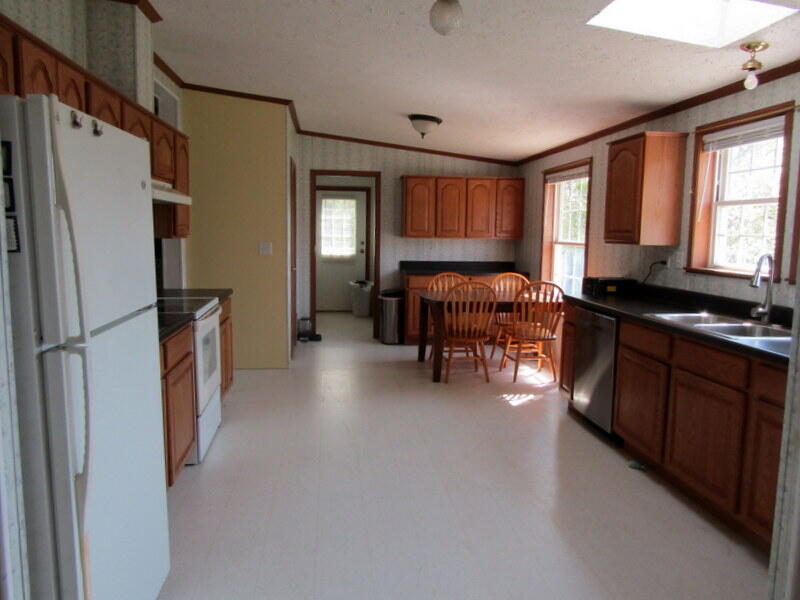 657 Brighton Hill Road Minot, ME 04258 - Photo 6 of 32 kitchen entrance from LR