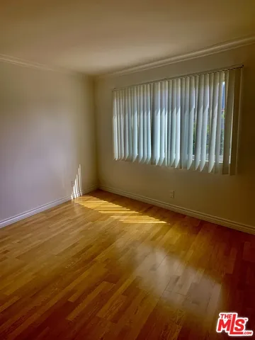 a view of an empty room with window