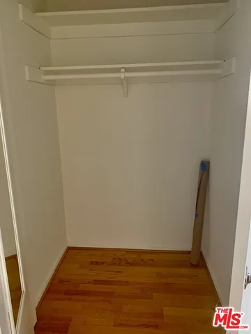 a view of small space with racks on the wall