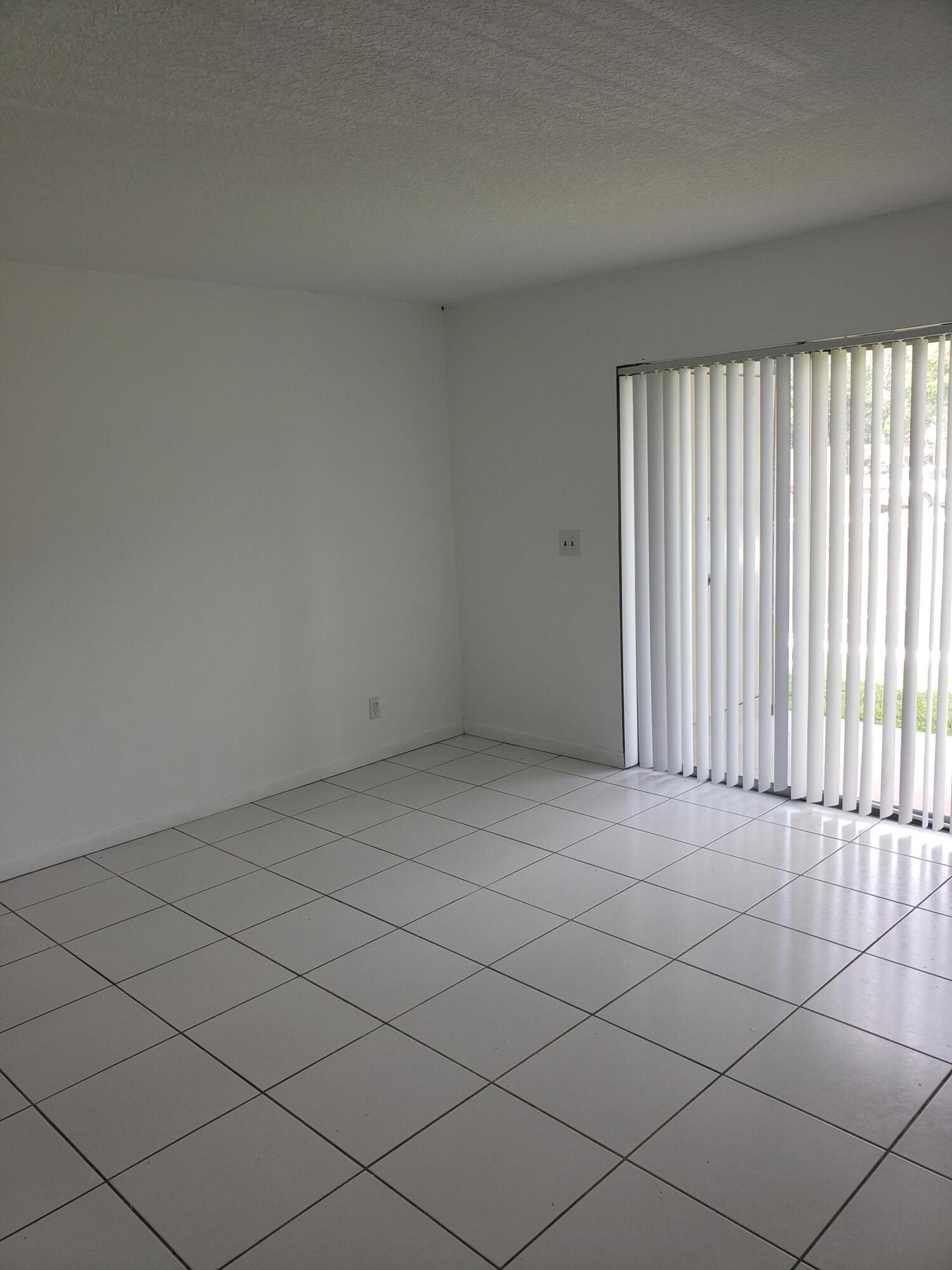 1854 Abbey Road, Unit 101 West Palm Beach, FL 33415 - Photo 12 of 16 20230703_120950