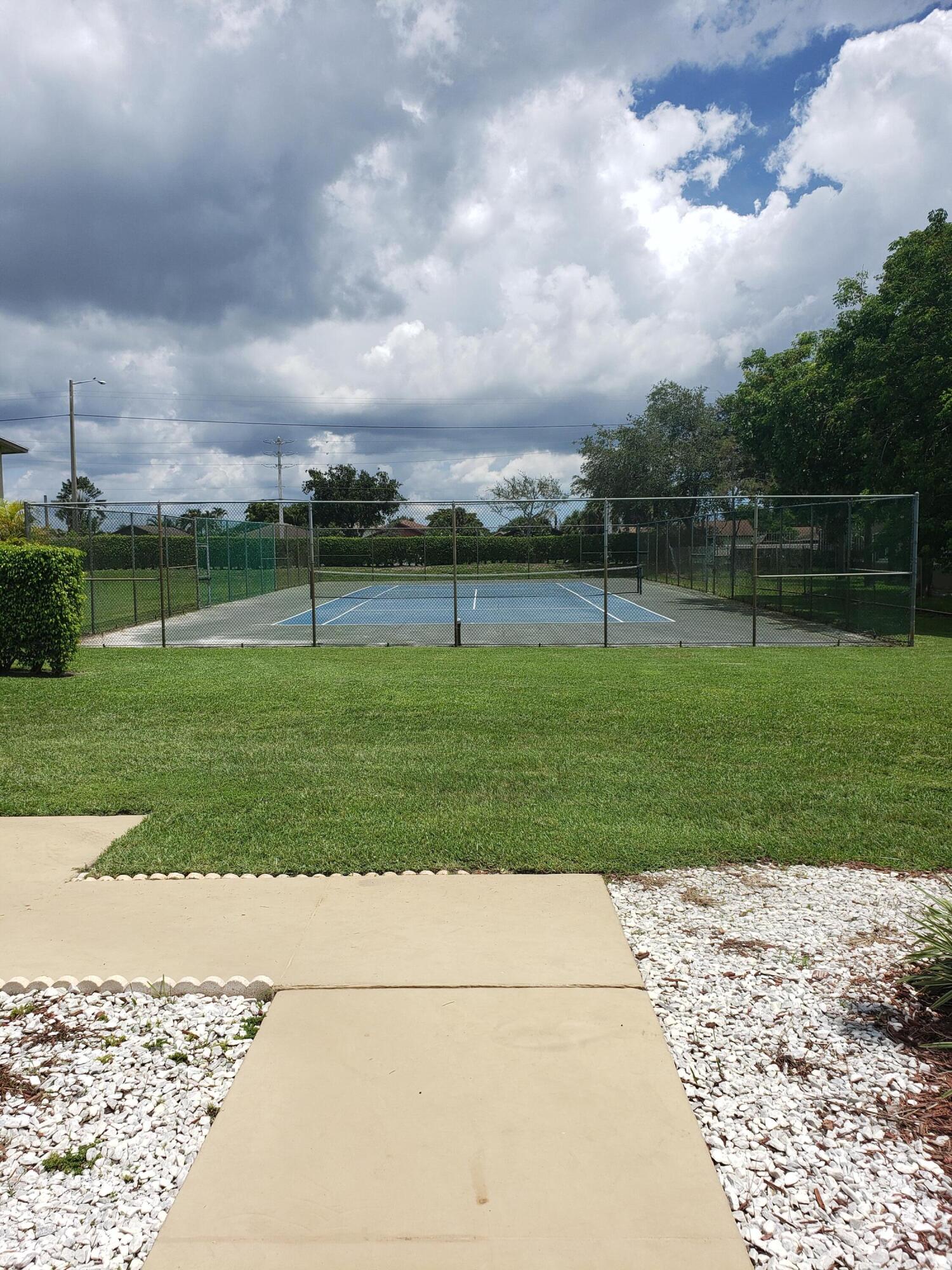 1854 Abbey Road, Unit 101 West Palm Beach, FL 33415 - Photo 15 of 16 Tennis Courts