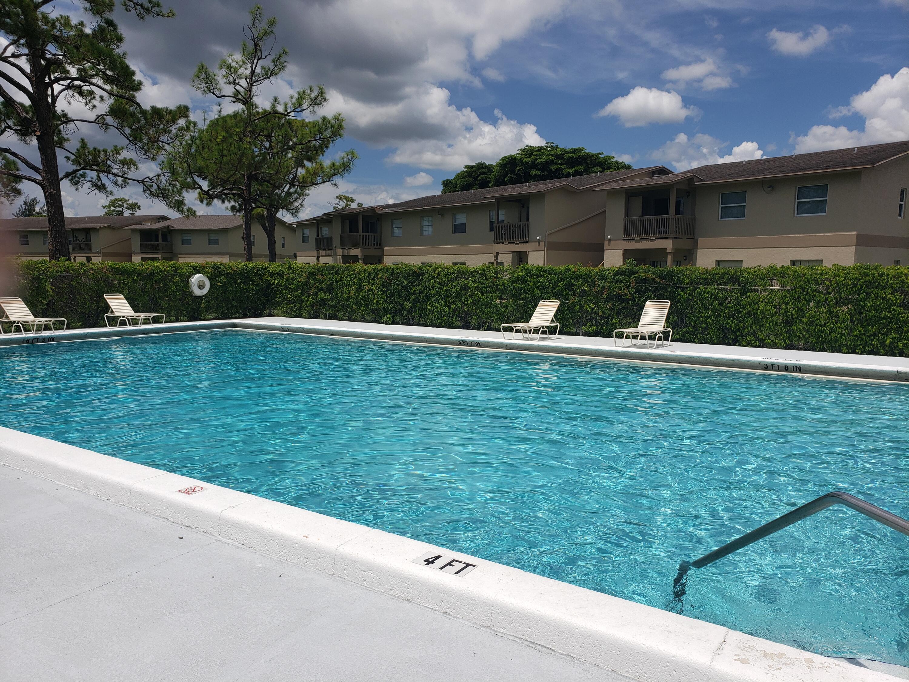 1854 Abbey Road, Unit 101 West Palm Beach, FL 33415 - Photo 16 of 16 Community Pool