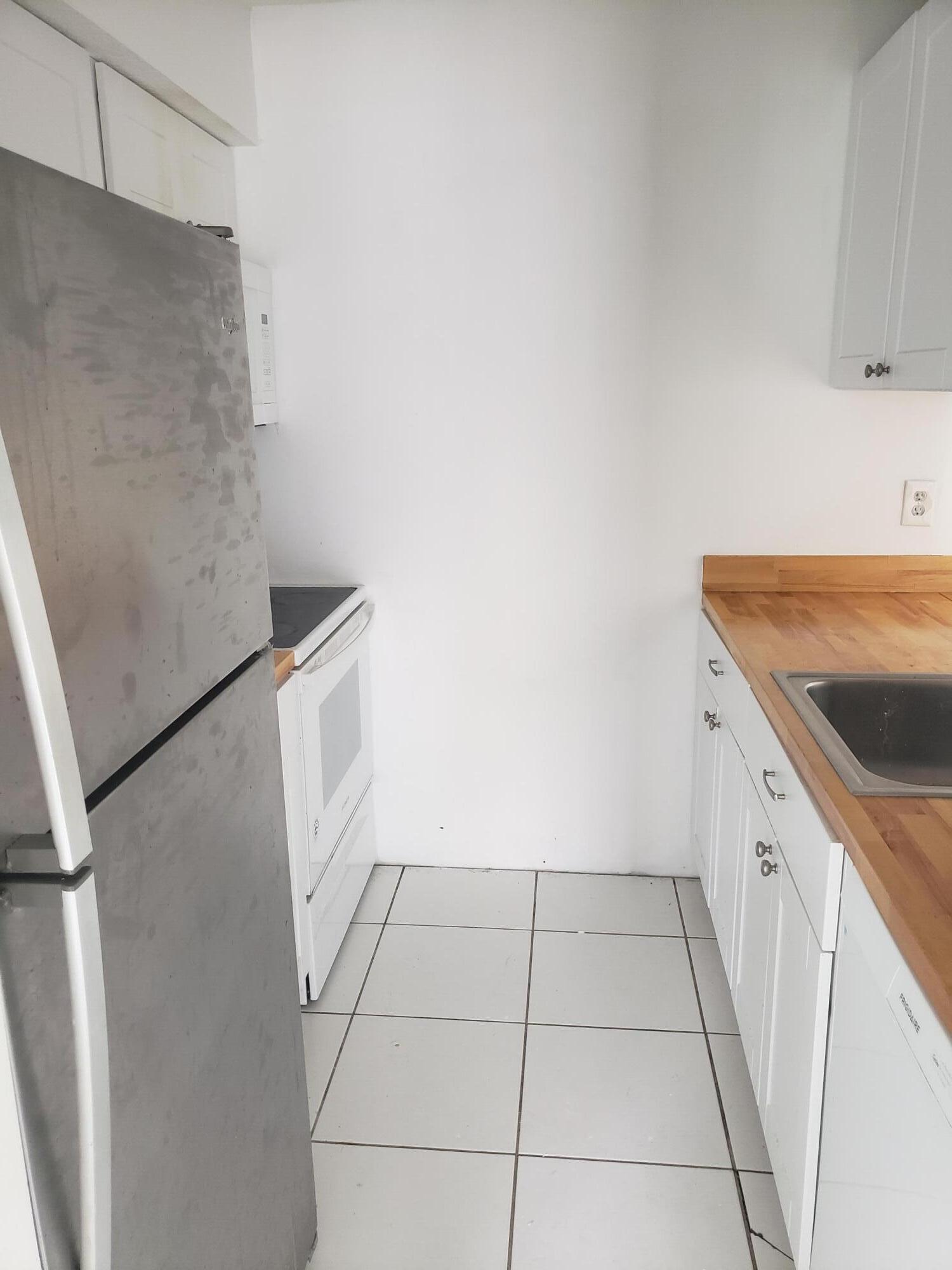 1854 Abbey Road, Unit 101 West Palm Beach, FL 33415 - Photo 3 of 16 20230703_120452