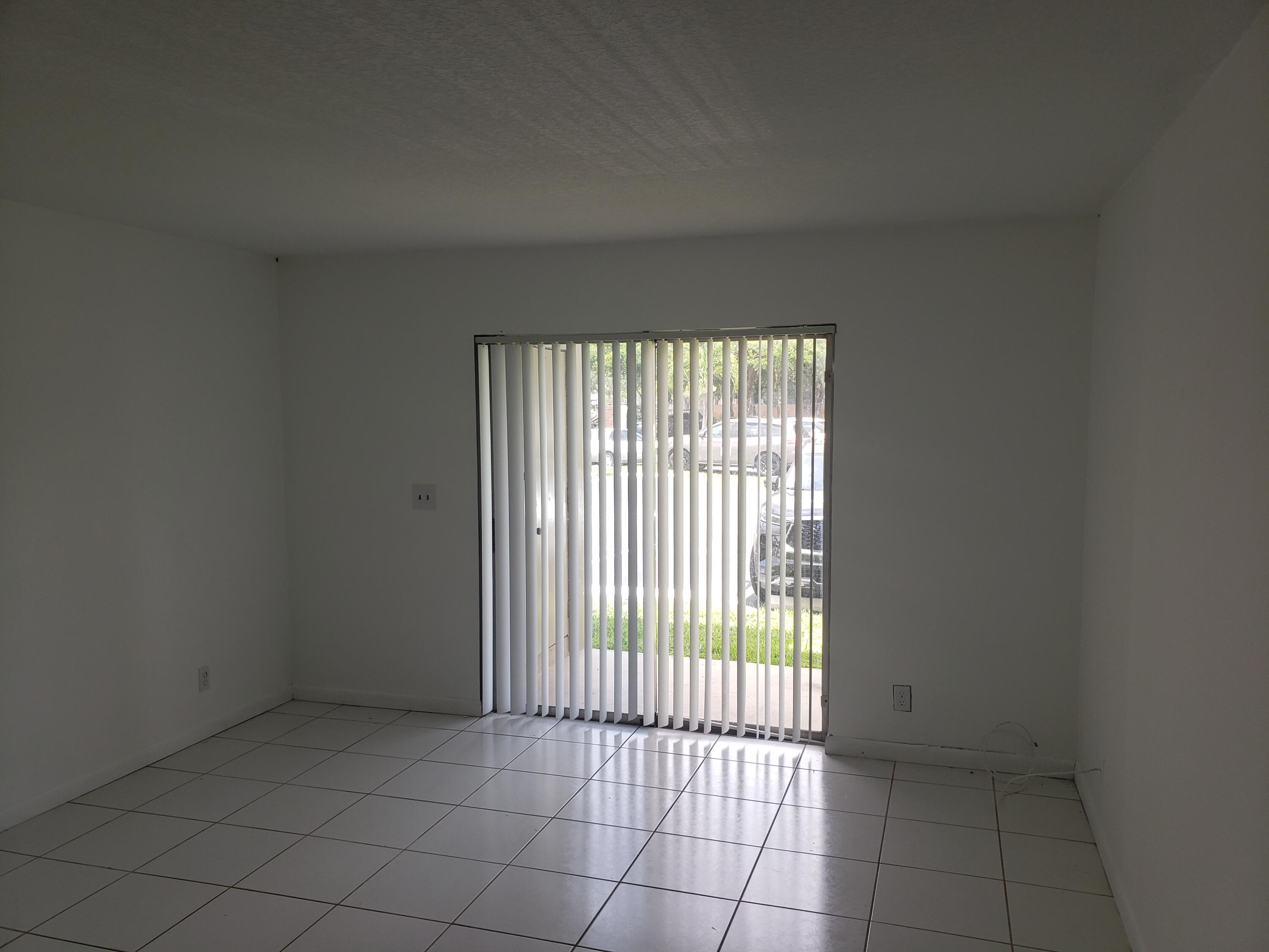 1854 Abbey Road, Unit 101 West Palm Beach, FL 33415 - Photo 6 of 16 20230703_120553