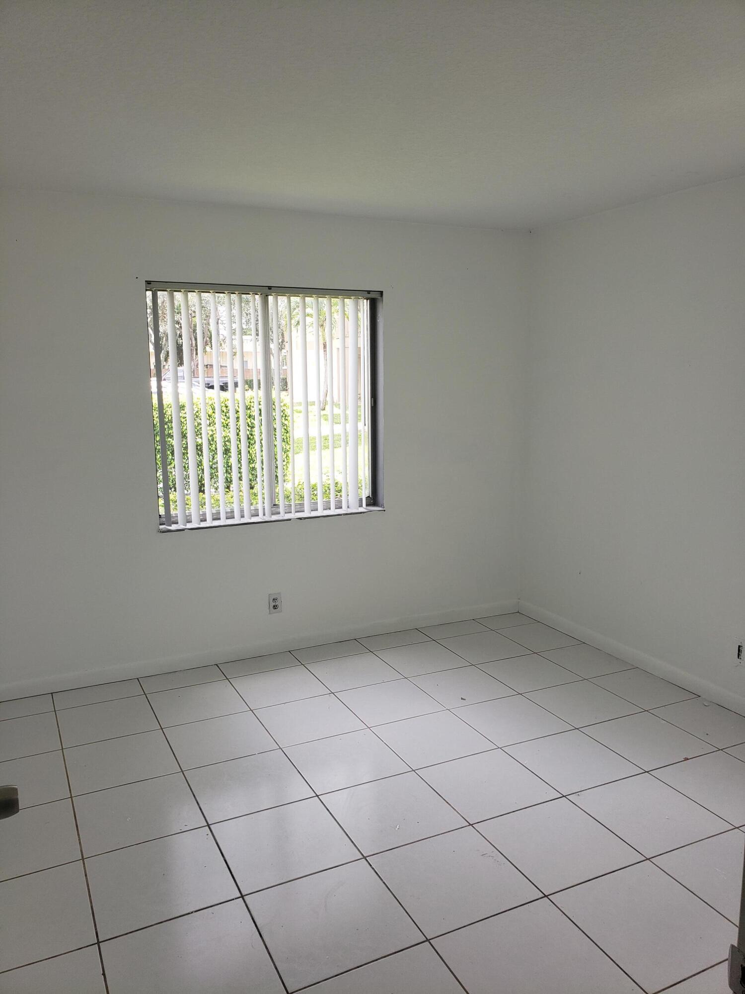 1854 Abbey Road, Unit 101 West Palm Beach, FL 33415 - Photo 9 of 16 20230703_120725