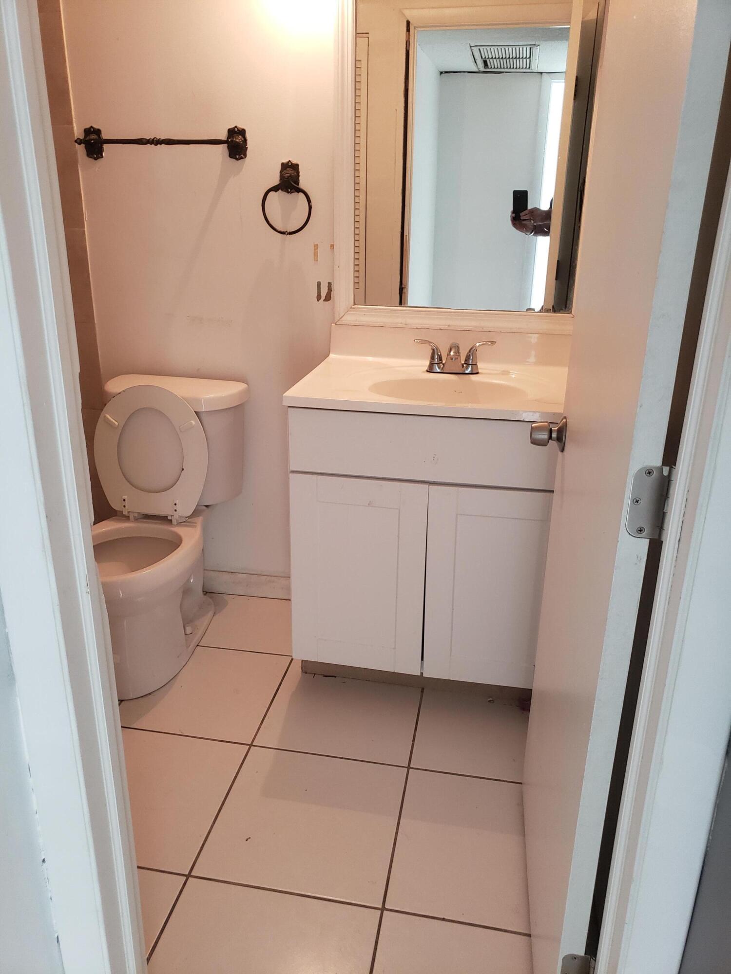 1854 Abbey Road, Unit 101 West Palm Beach, FL 33415 - Photo 10 of 16 20230703_120827