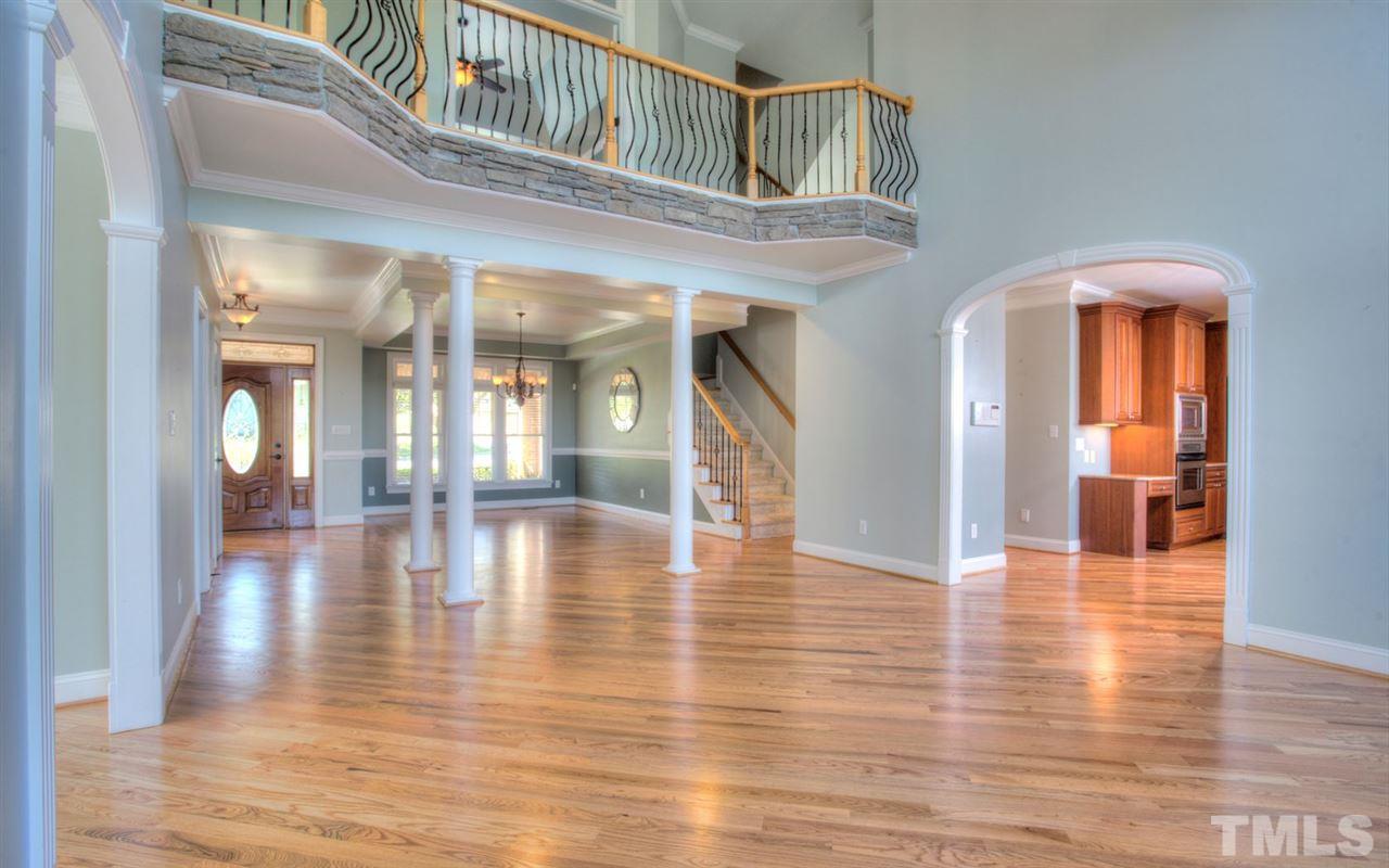 5220 Tallowtree Drive Raleigh, NC 27613 - Photo 3 of 25 Updated wrought-iron spindles.