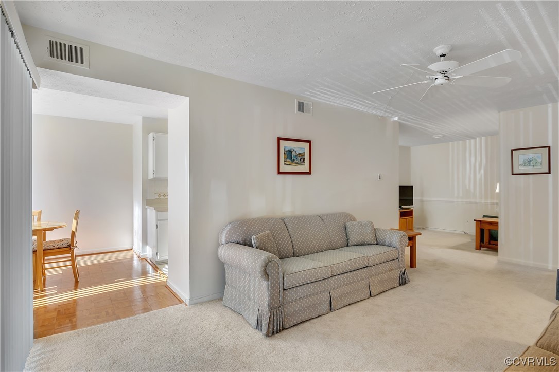1505 Regency Woods Road, Unit 101 Henrico, VA 23238 - Photo 11 of 25 Living room leading to eat-in kitchen