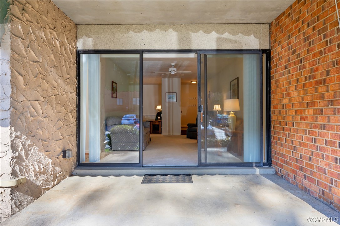1505 Regency Woods Road, Unit 101 Henrico, VA 23238 - Photo 4 of 25 Sliding doors leading from patio to livingroom