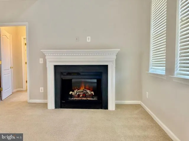 a living room with a fireplace