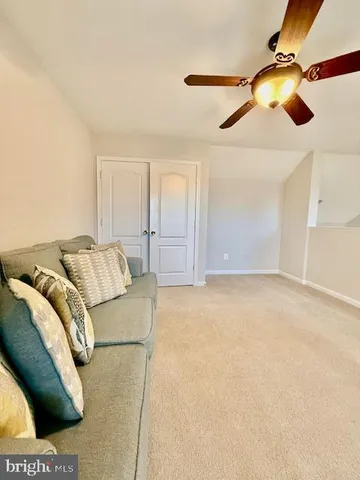 a spacious bathroom with a tub sink and shower