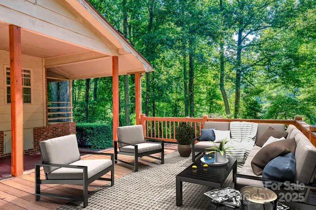 a outdoor living space with furniture and garden view