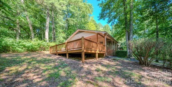 a view of a house with a tree