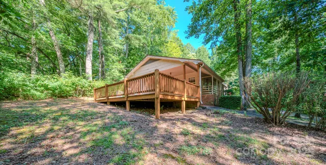 a house with trees in the background