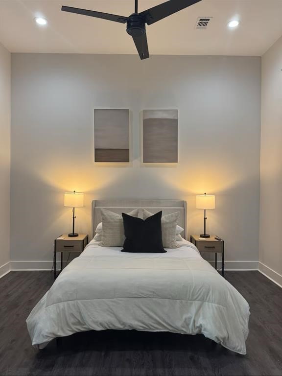 3610 Dreyfus Street, Unit A Houston, TX 77021 - Photo 10 of 20 a bedroom with a bed and night stand