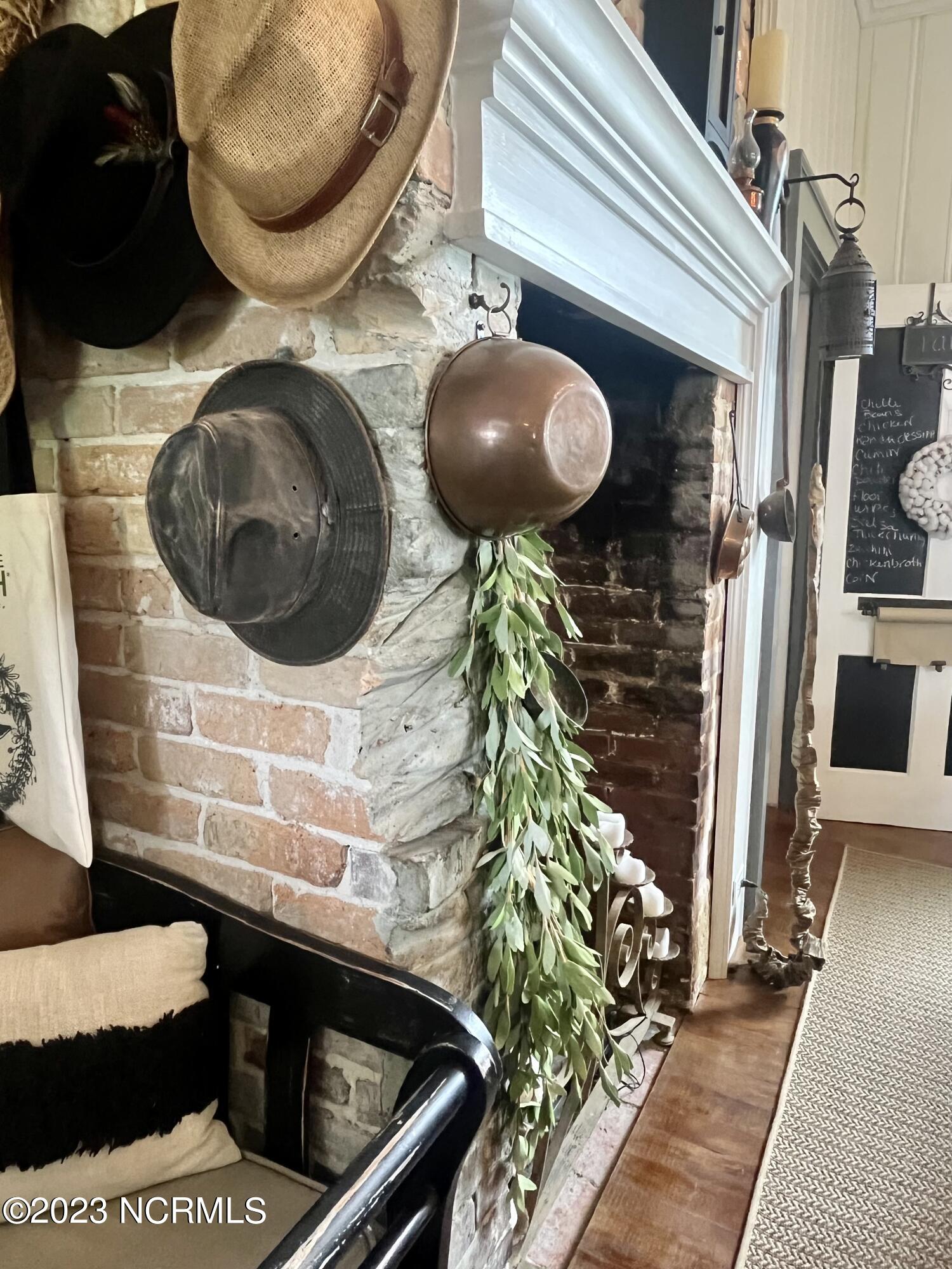 142 Drewery Road Como, NC 27818 - Photo 32 of 113 Knives were sharpened for years on this fireplace!