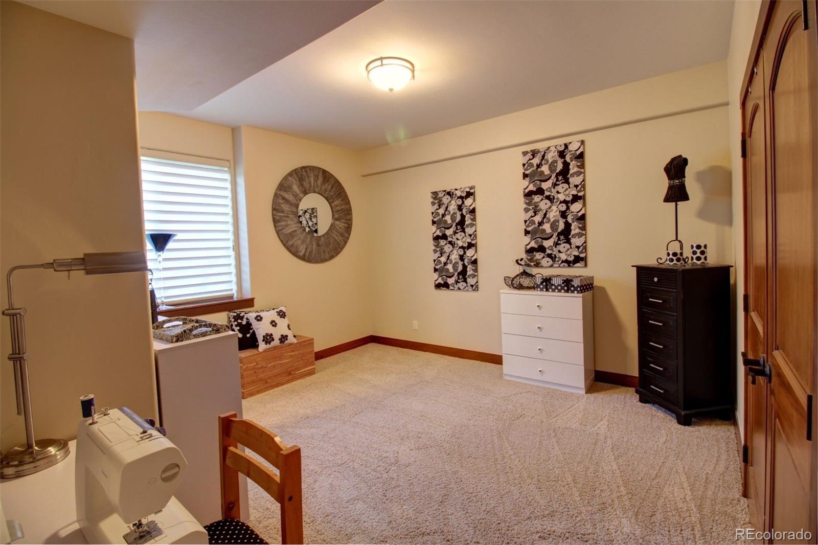 3095 South Piney Ridge Road Evergreen, CO 80439 - Photo 22 of 30 wooden floor in a room