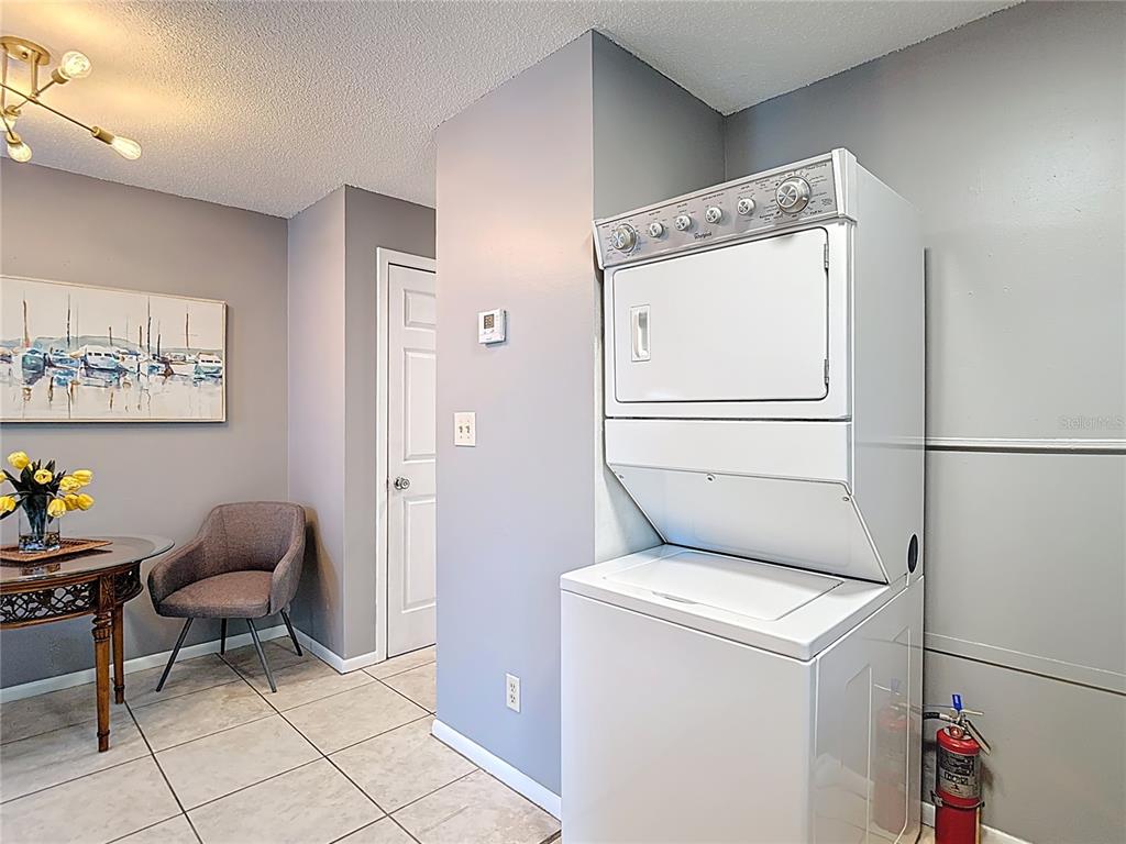137 Southeast Jefferson Circle North St. Petersburg, FL 33703 - Photo 23 of 24 a utility room with dryer and washer