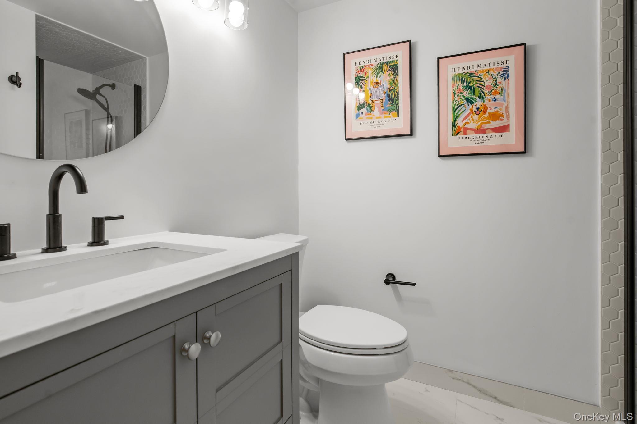 50 Bayberry Drive Peekskill, NY 10566 - Photo 15 of 38 a bathroom with a toilet a sink and mirror