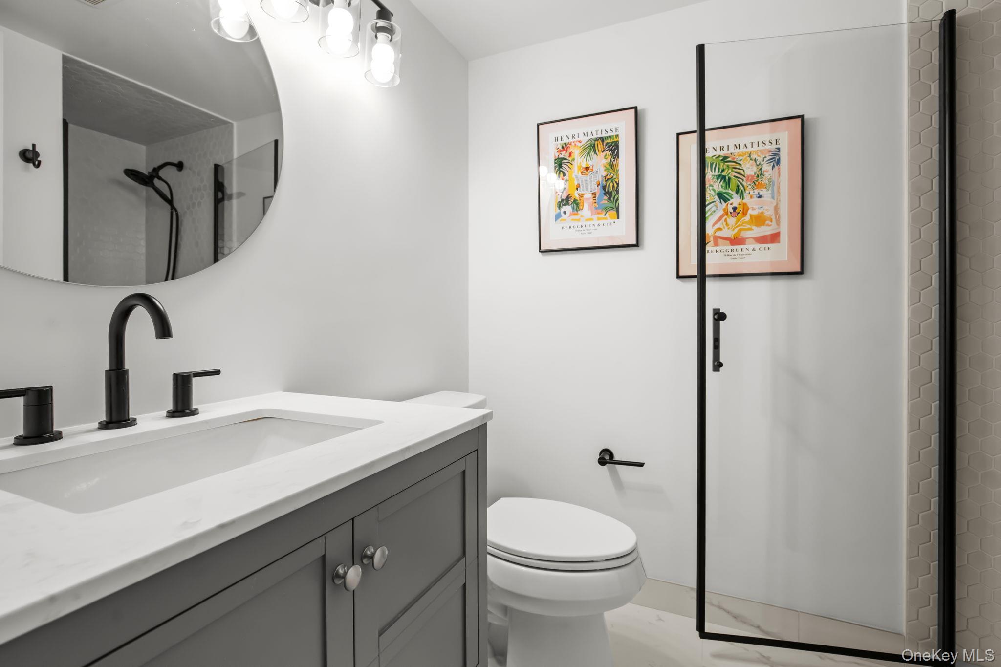 50 Bayberry Drive Peekskill, NY 10566 - Photo 16 of 38 a bathroom with a sink mirror vanity and toilet
