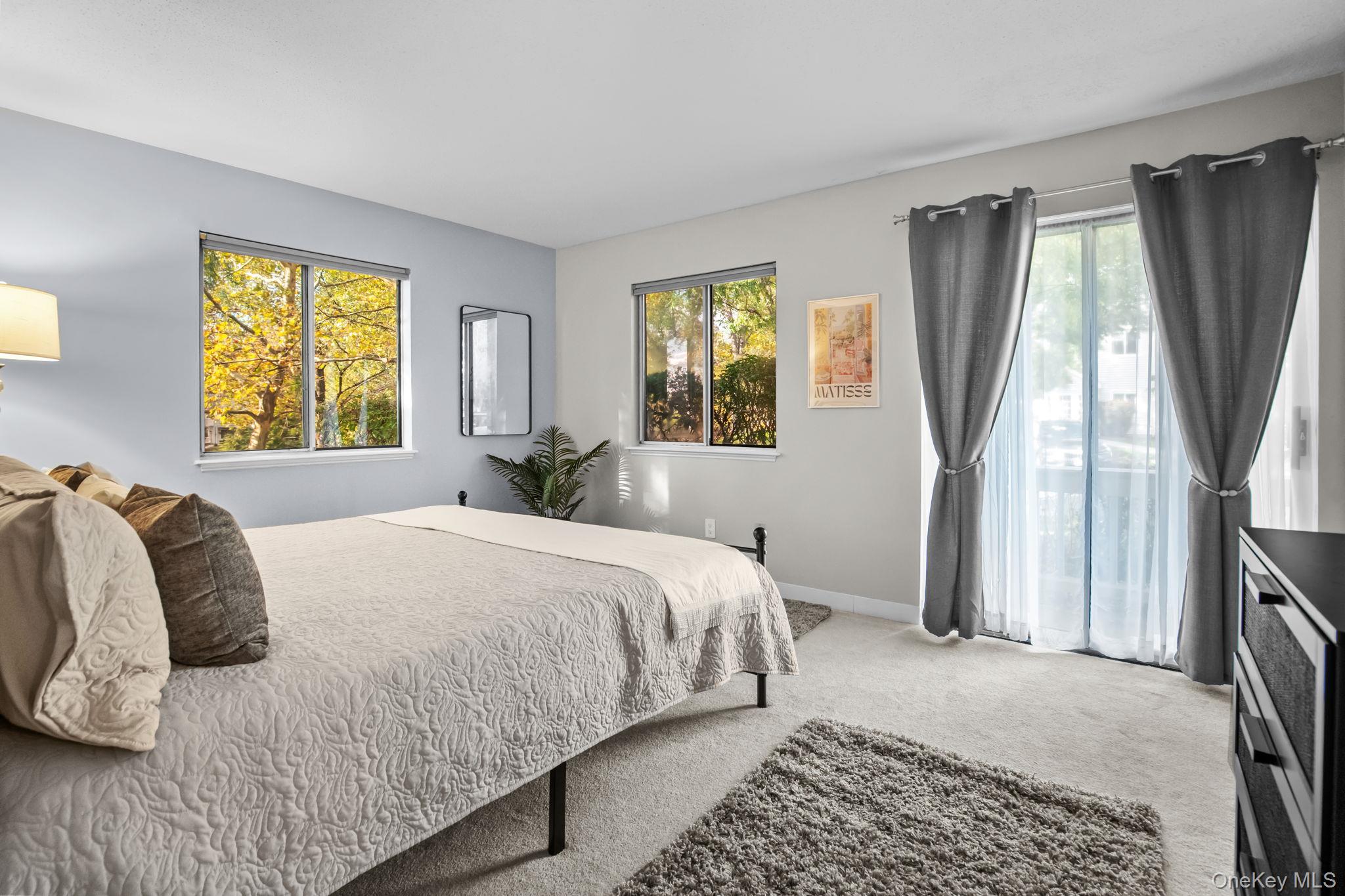 50 Bayberry Drive Peekskill, NY 10566 - Photo 17 of 38 a bedroom with a bed and a window