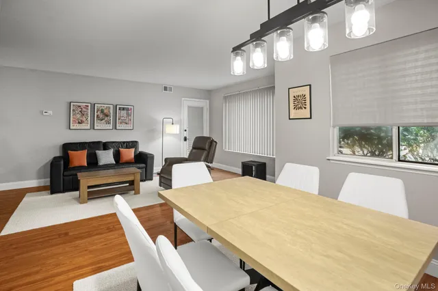 a bedroom with a large bed and a couch