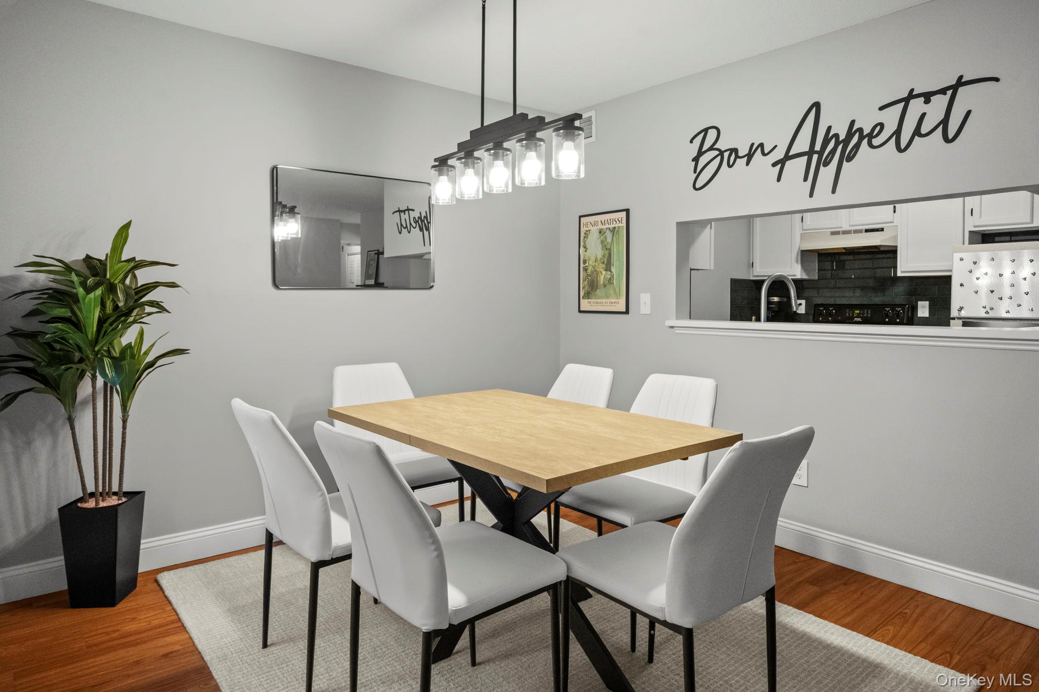 50 Bayberry Drive Peekskill, NY 10566 - Photo 7 of 38 a view of a dining room with furniture and wooden floor