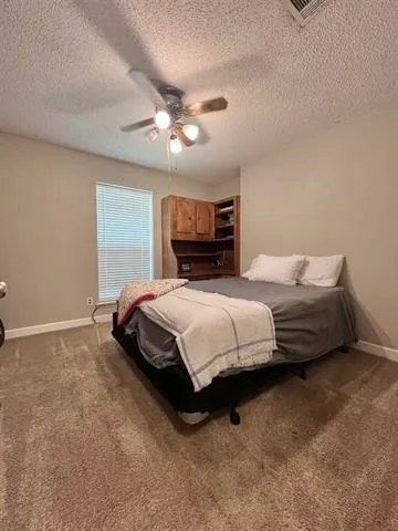 a view of a workspace with furniture