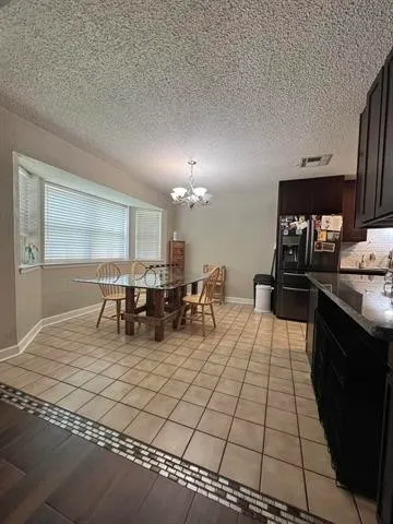 a living room with chairs