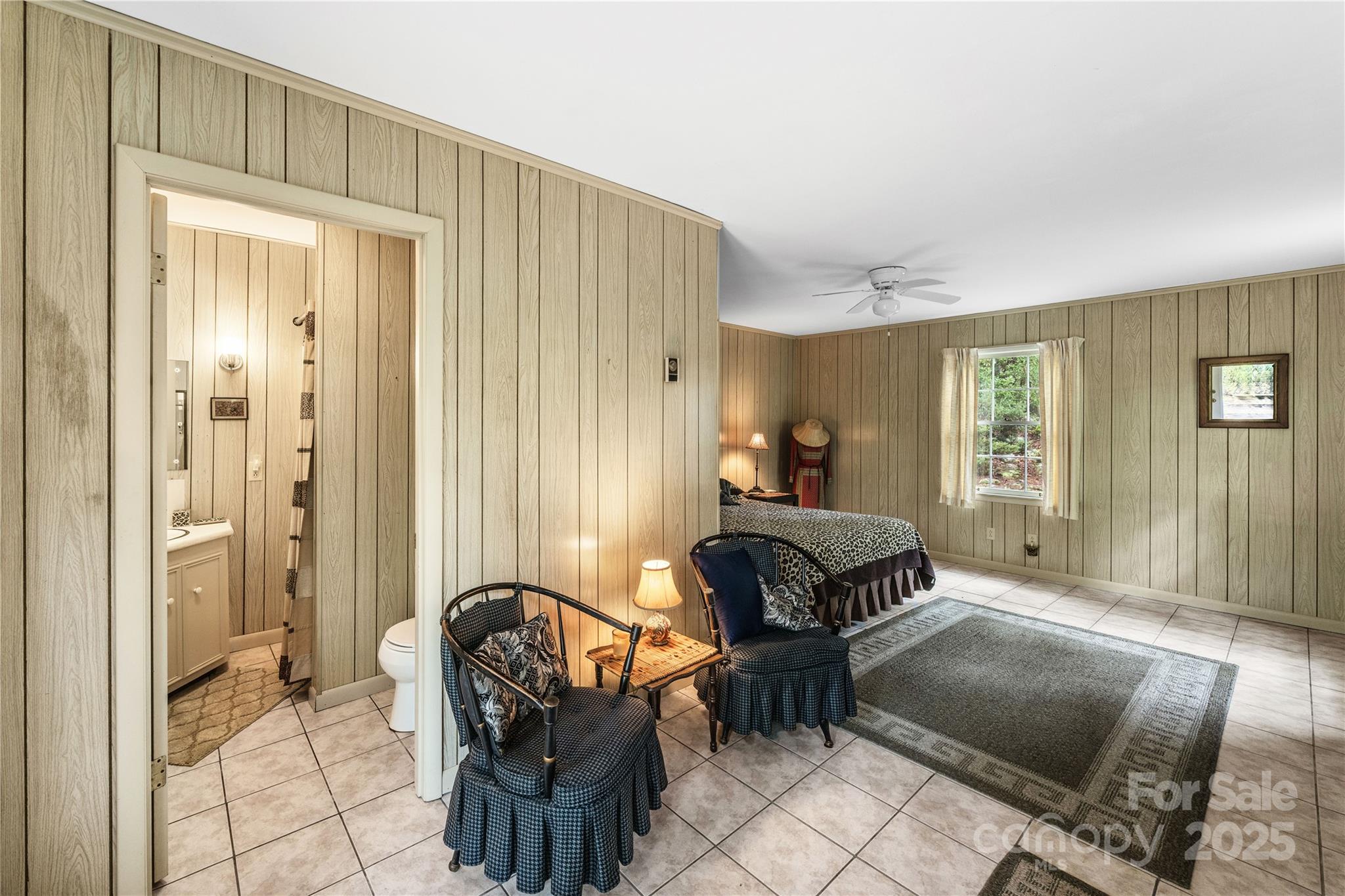 603 Green Hills Road Mill Spring, NC 28756 - Photo 14 of 47 a living room with furniture and a window