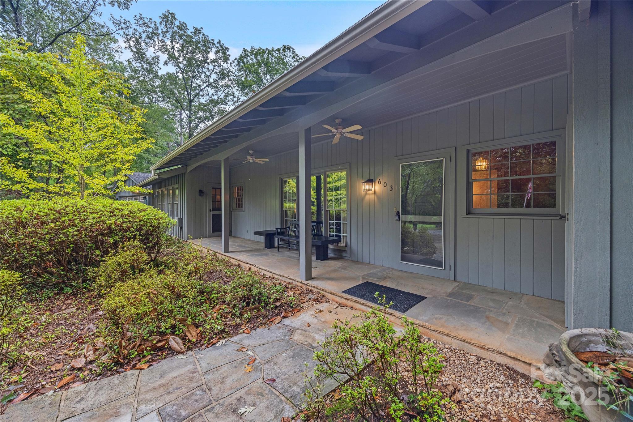 603 Green Hills Road Mill Spring, NC 28756 - Photo 2 of 47 a view of backyard of the house