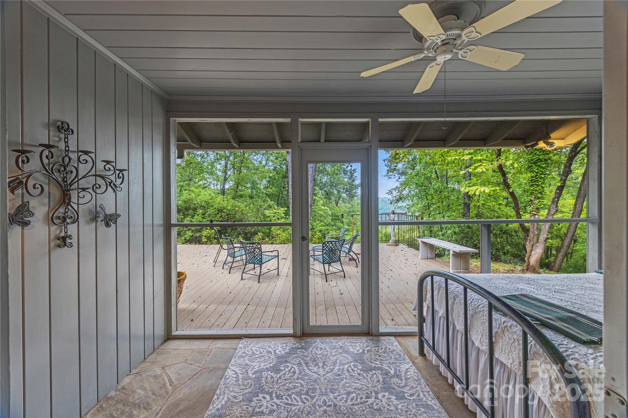 603 Green Hills Road Mill Spring, NC 28756 - Photo 32 of 47 a view of a porch with wooden floor and outdoor space