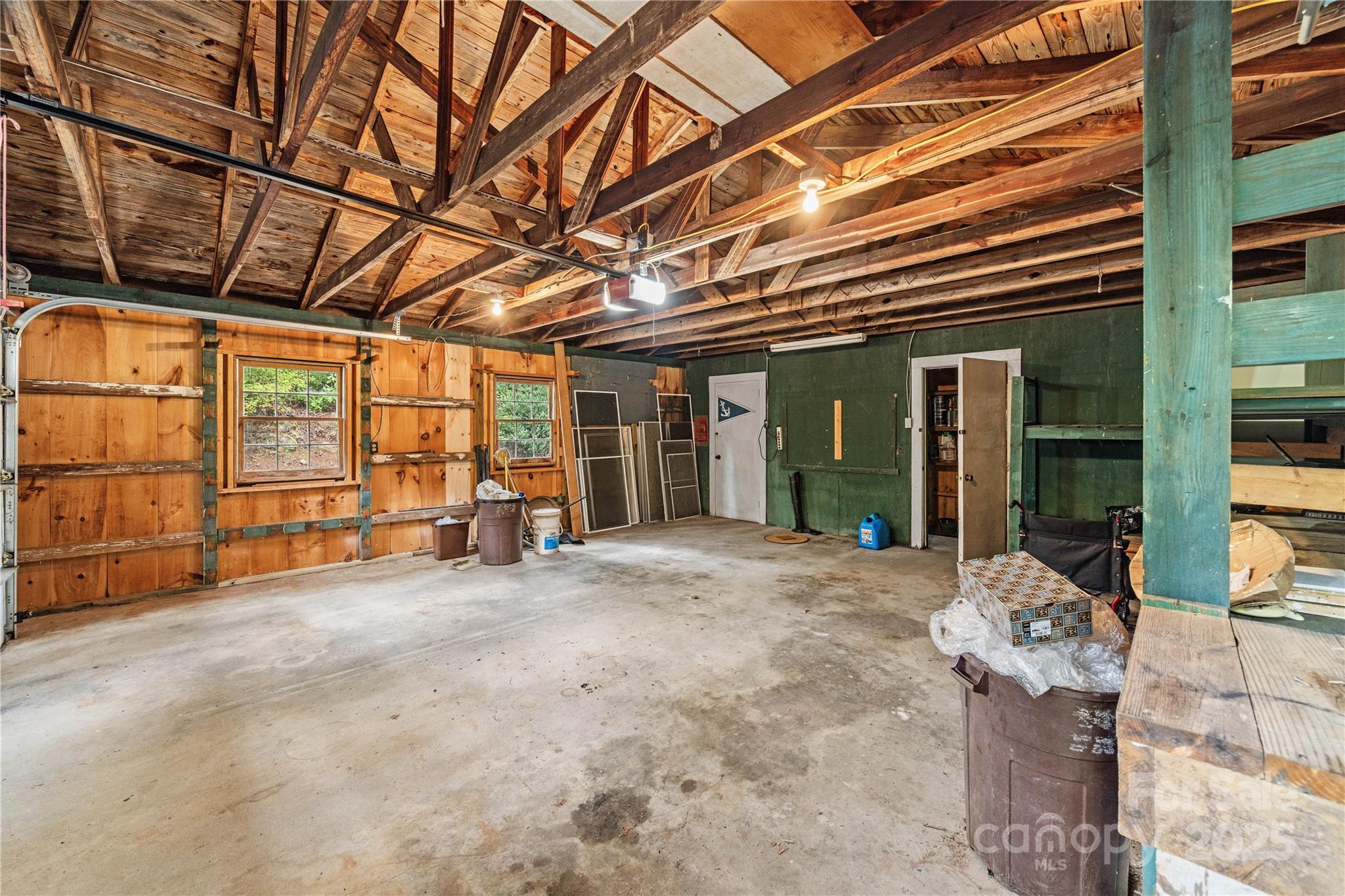 603 Green Hills Road Mill Spring, NC 28756 - Photo 34 of 47 a view of a room with gym equipment
