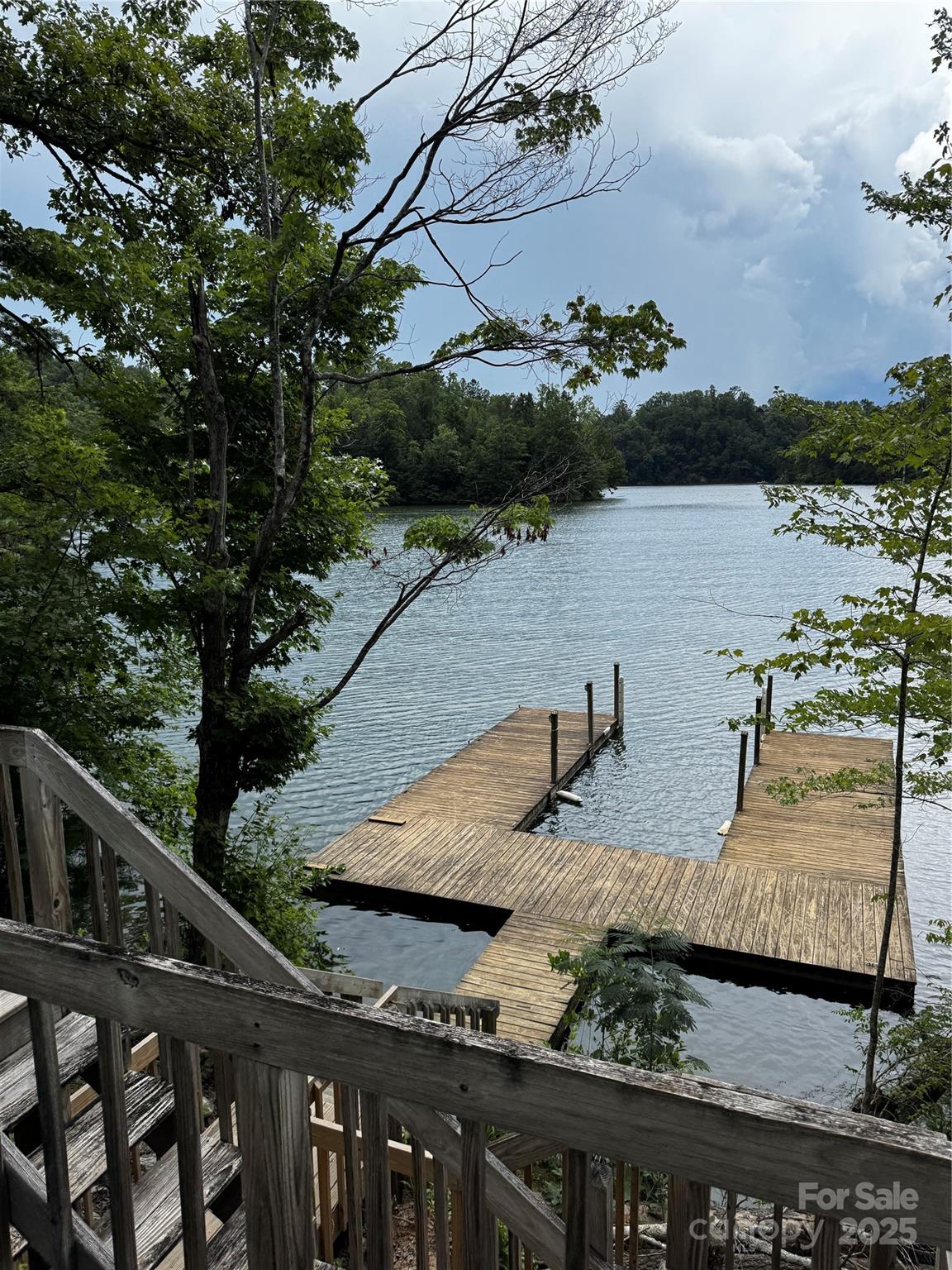 603 Green Hills Road Mill Spring, NC 28756 - Photo 46 of 47 a view of a lake from a balcony
