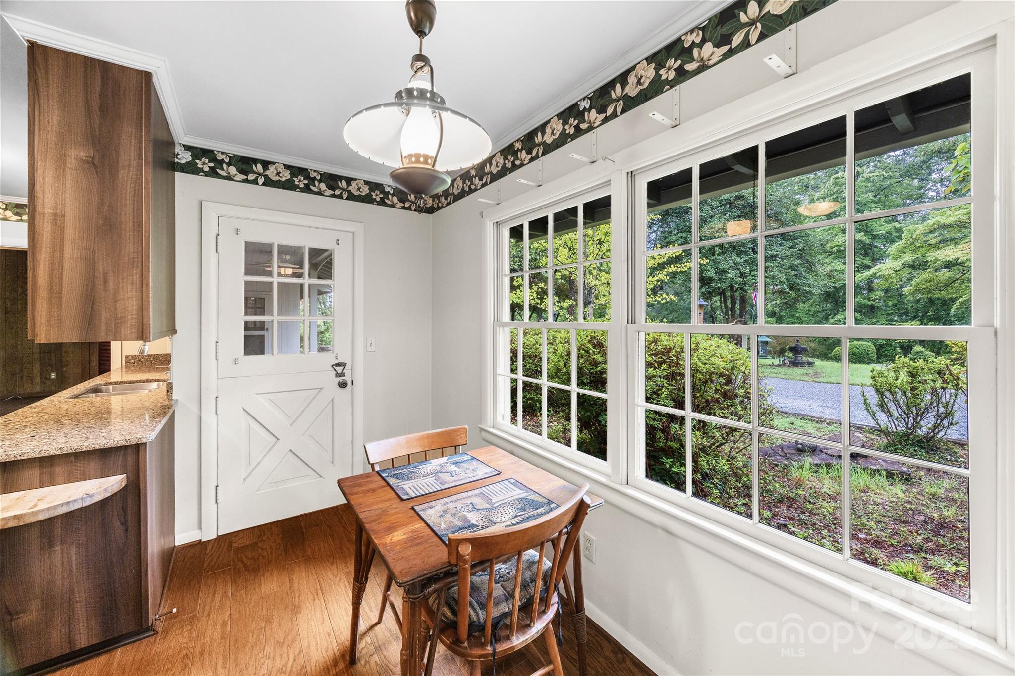 603 Green Hills Road Mill Spring, NC 28756 - Photo 8 of 47 a very nice looking living room with a large window