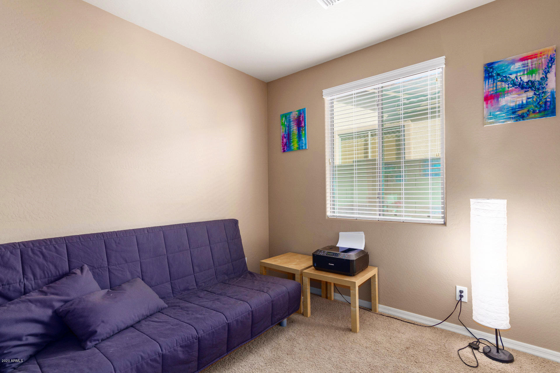 2334 West Beverly Rd. Phoenix, AZ 85041 - Photo 23 of 40 a living room with furniture and a window