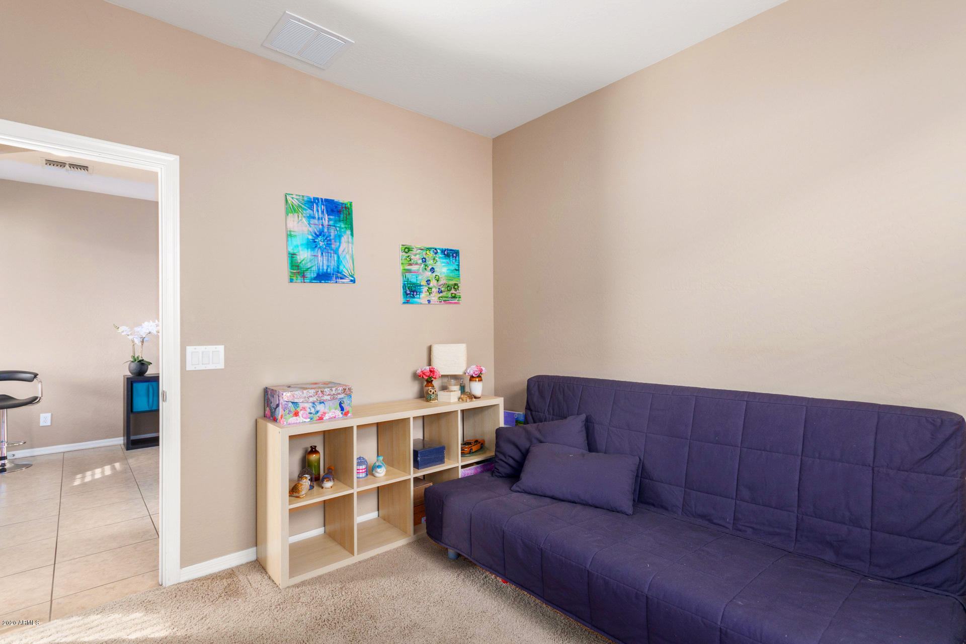2334 West Beverly Rd. Phoenix, AZ 85041 - Photo 24 of 40 a living room with furniture and a window