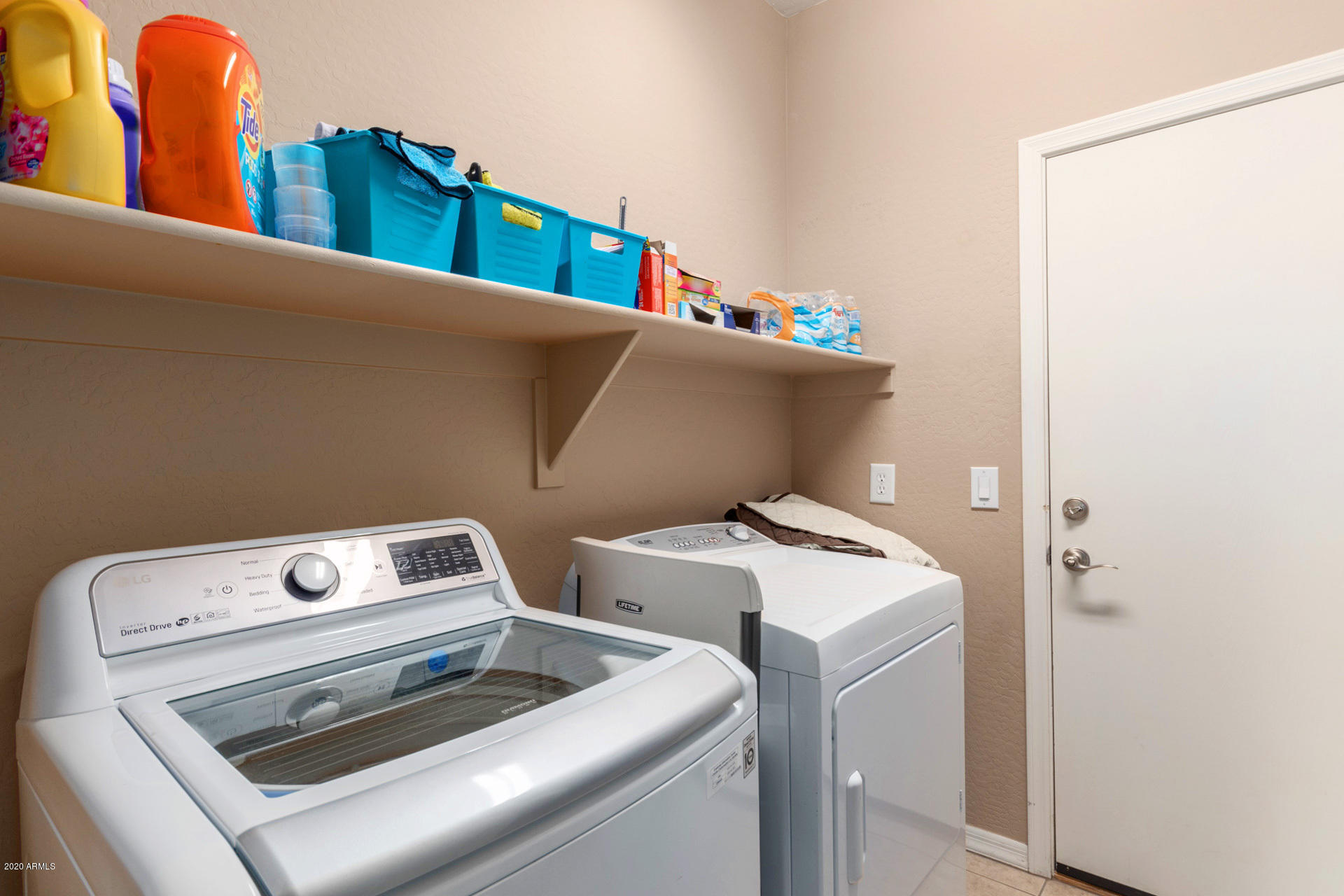 2334 West Beverly Rd. Phoenix, AZ 85041 - Photo 26 of 40 a utility room with dryer and washer