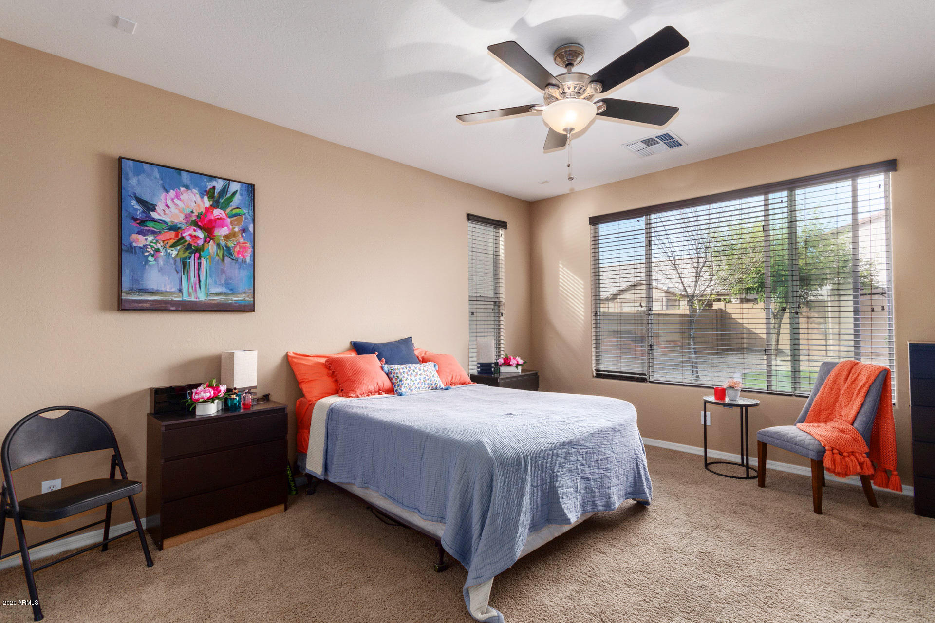 2334 West Beverly Rd. Phoenix, AZ 85041 - Photo 28 of 40 a bedroom with a bed and a large window