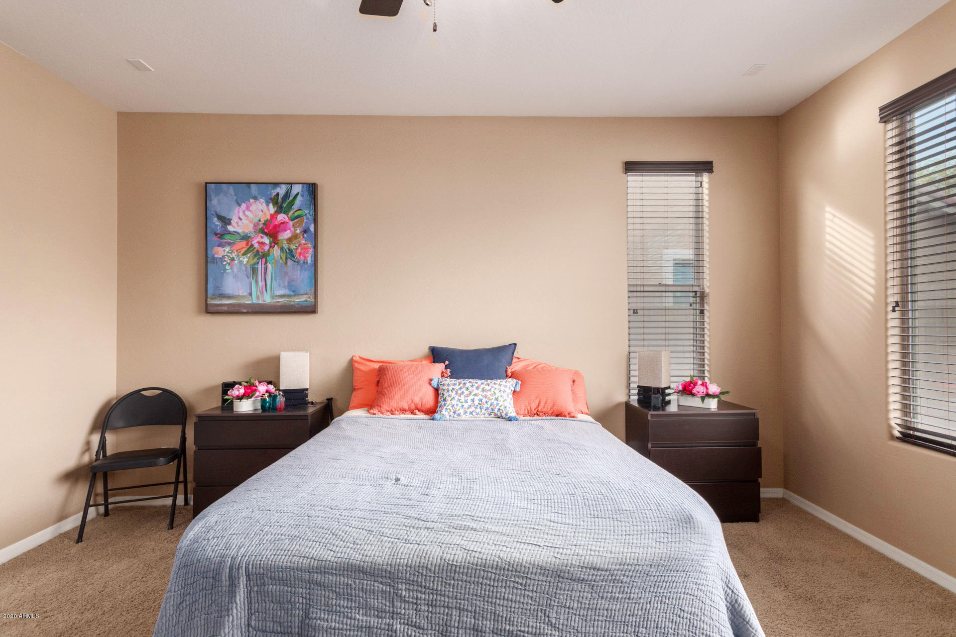 2334 West Beverly Rd. Phoenix, AZ 85041 - Photo 30 of 40 a bedroom with a bed and a window