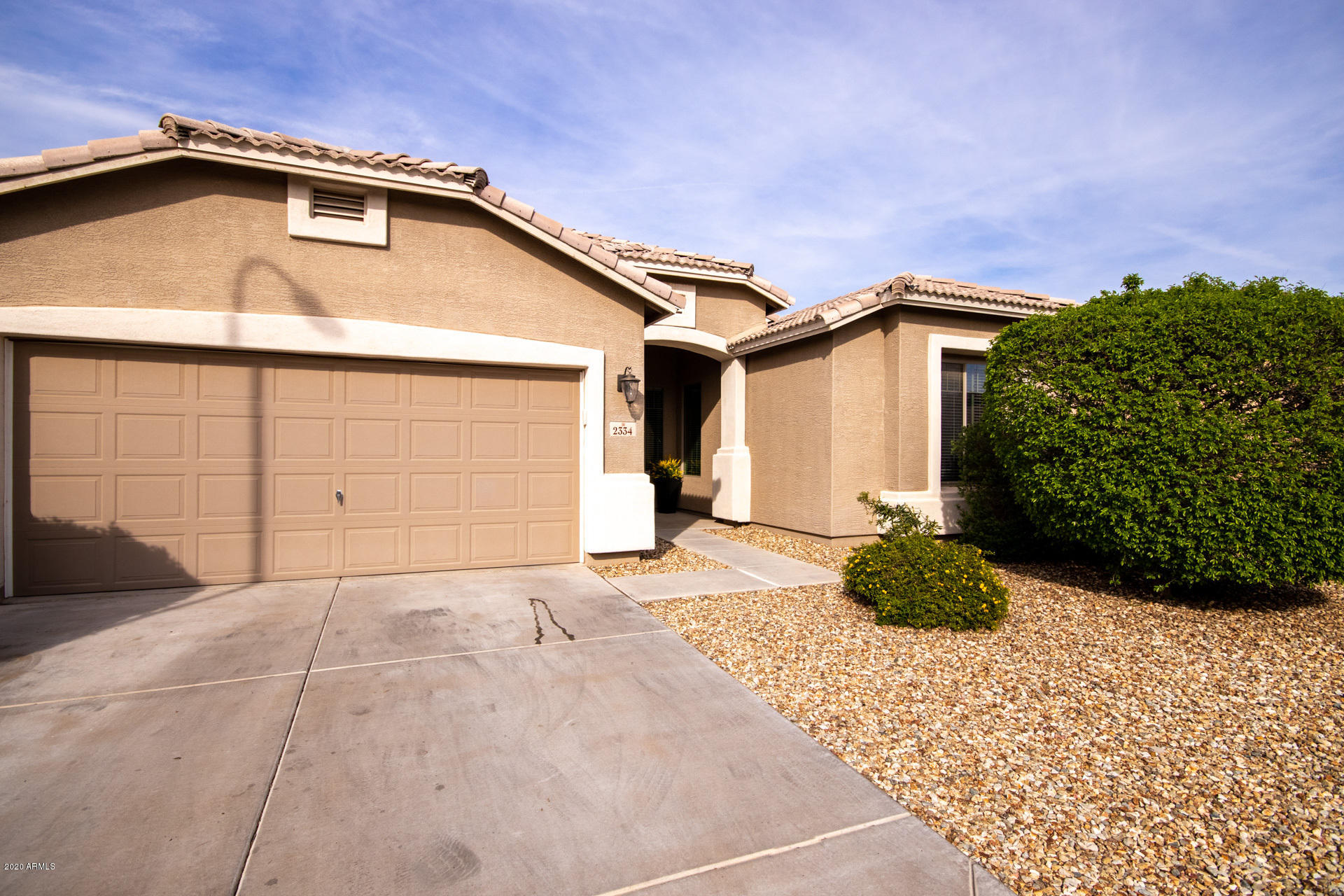 2334 West Beverly Rd. Phoenix, AZ 85041 - Photo 3 of 40 a front view of a house with a yard